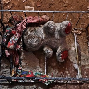 20160507_A-charred-burnt-baby-cot-after-blaze-in-gaza-home