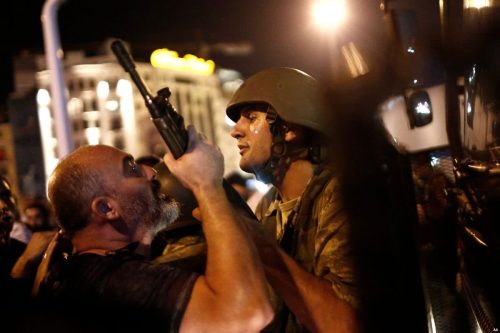 turkish-coup-attempt-turkish-soldier-clashing-with-man-in-Taskim-Square