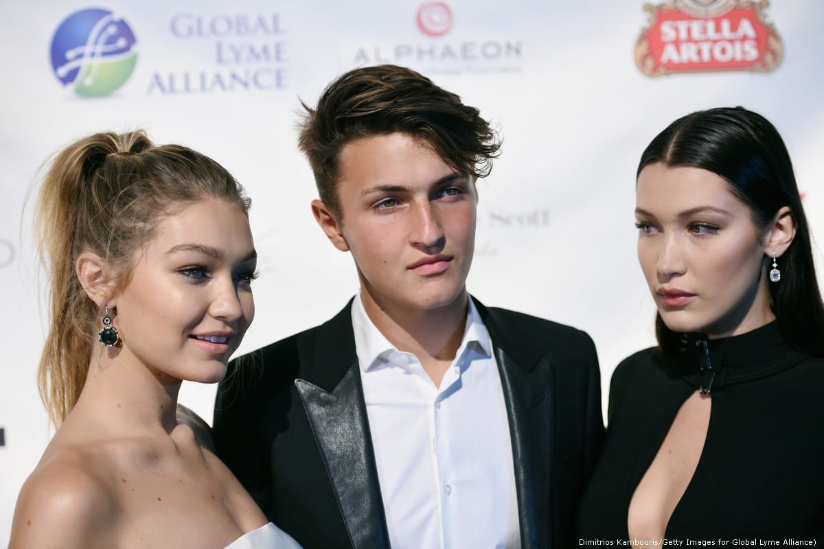 Gigi Hadid (L), Anwar Hadid (C) and Bella Hadid in New York City on 10 October 2015 [Dimitrios Kambouris/Getty Images for Global Lyme Alliance]
