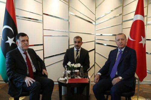 Turkish President Recep Tayyip Erdogan (R) meets with Chairman of the Presidential Council of Libya’s Government of National Accord (GNA) Fayez al-Sarraj (L) within the Berlin Conference on Libyan peace in Berlin, Germany on 19 January 2020. [Turkish Presidency / Murat Cetinmuhurdar / Handout - Anadolu Agency]