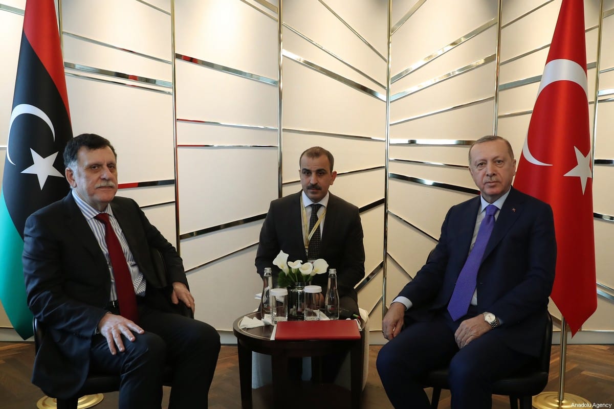 Turkish President Recep Tayyip Erdogan (R) meets with Chairman of the Presidential Council of Libya’s Government of National Accord (GNA) Fayez al-Sarraj (L) within the Berlin Conference on Libyan peace in Berlin, Germany on 19 January 2020. [Turkish Presidency / Murat Cetinmuhurdar / Handout - Anadolu Agency]