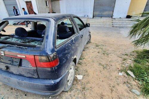 A damaged vehicle is seen after militias loyal to renegade commander Khalifa Haftar conducted an artillery fire in Tripoli, Libya on February 12, 2020 [Hazem Turkia / Anadolu Agency]